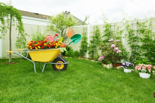 Volunteers sorting garden waste into separate containers